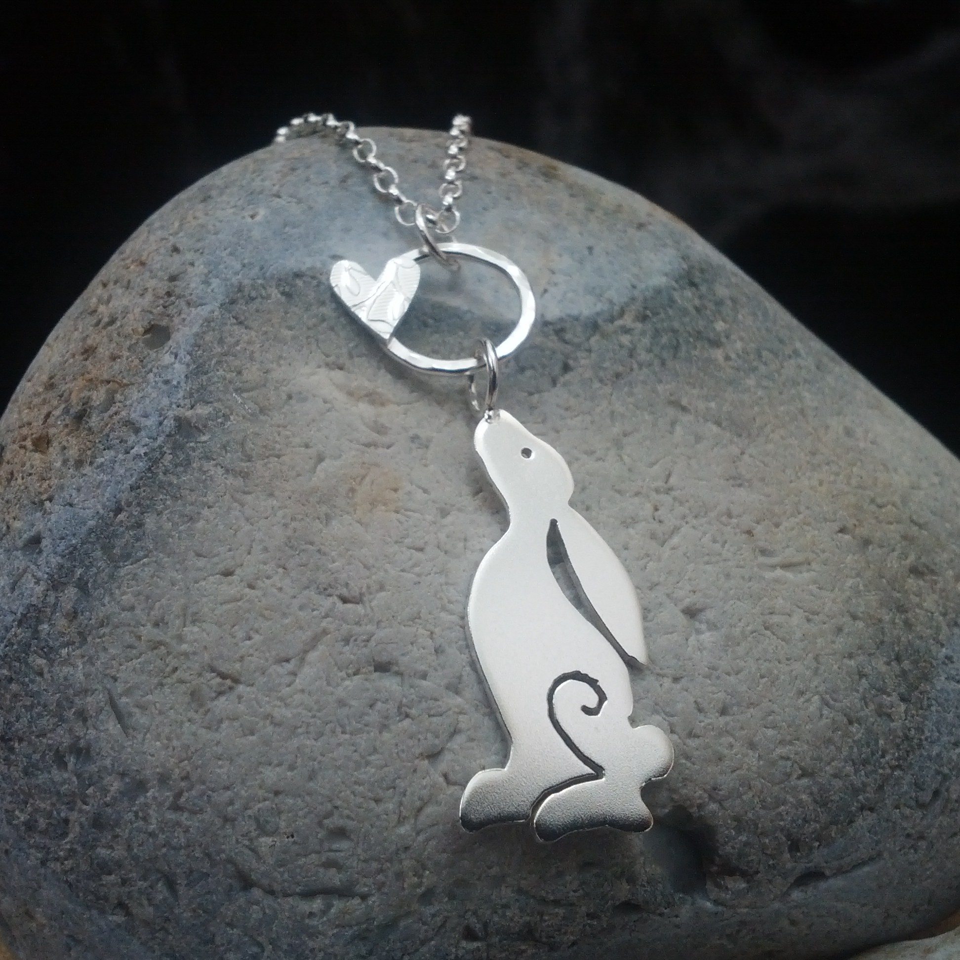 Silver moon gazing hare pendant