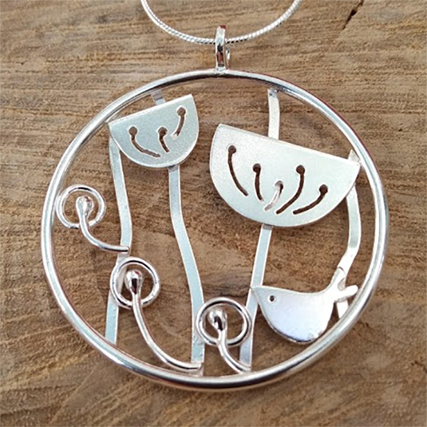 Silver bird and meadow pendant
