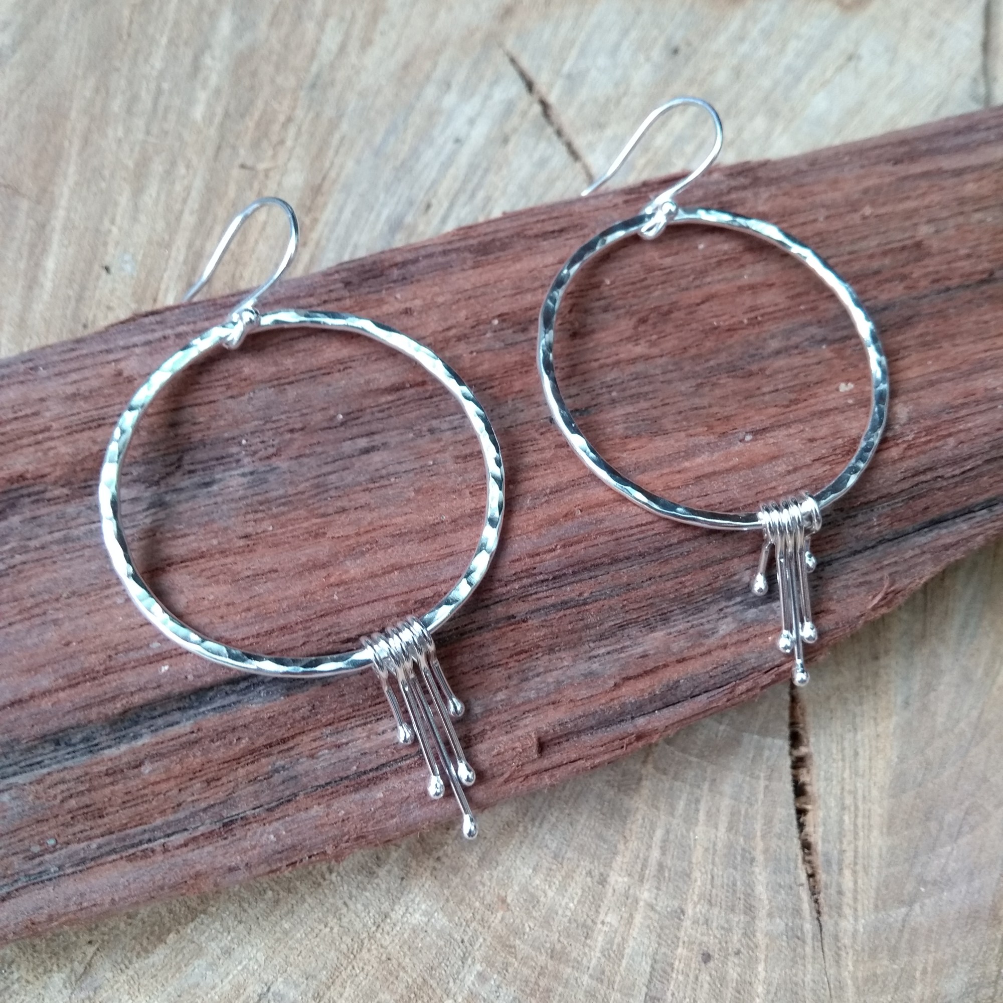 Large hammered circles with dangles