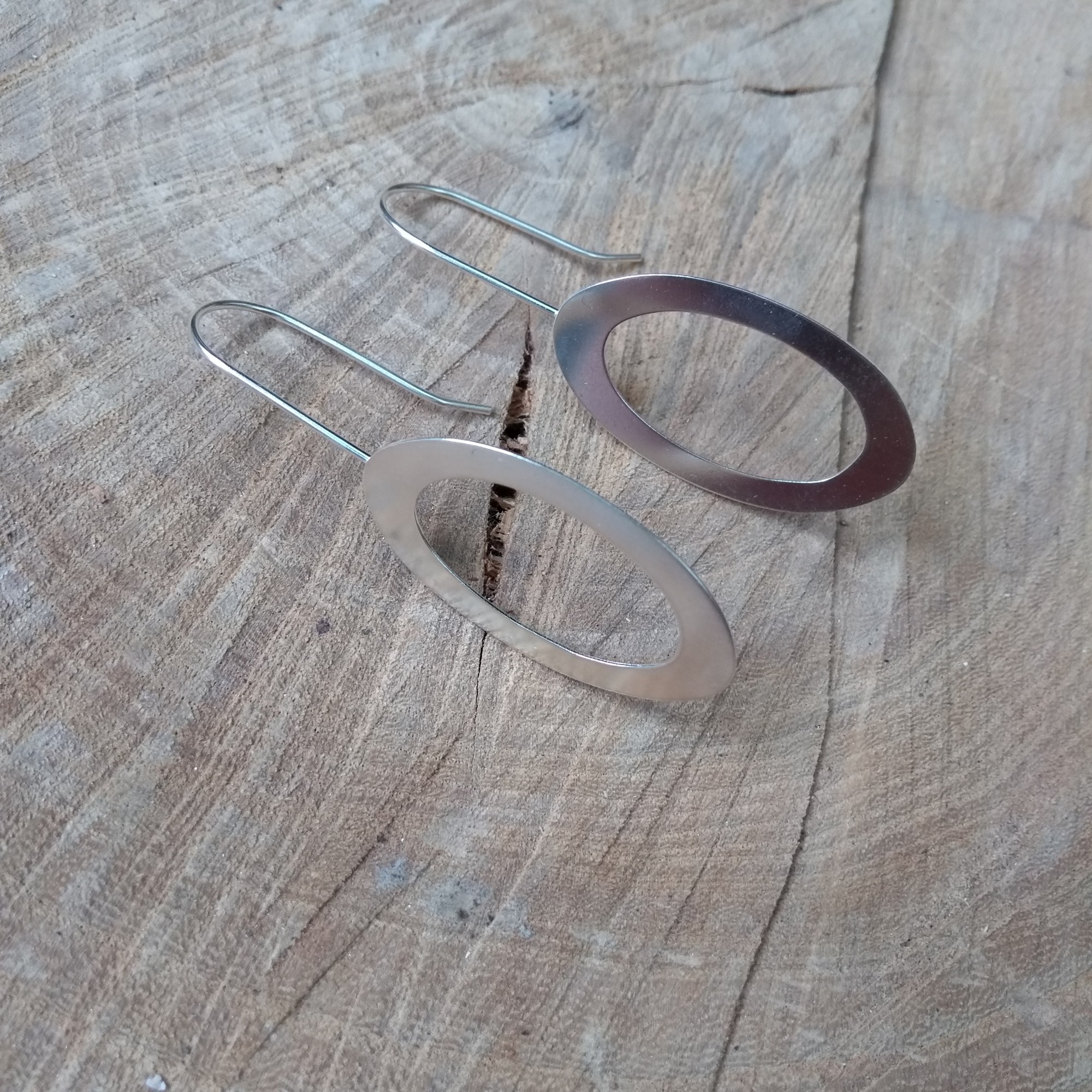 Silver oval dangle earrings