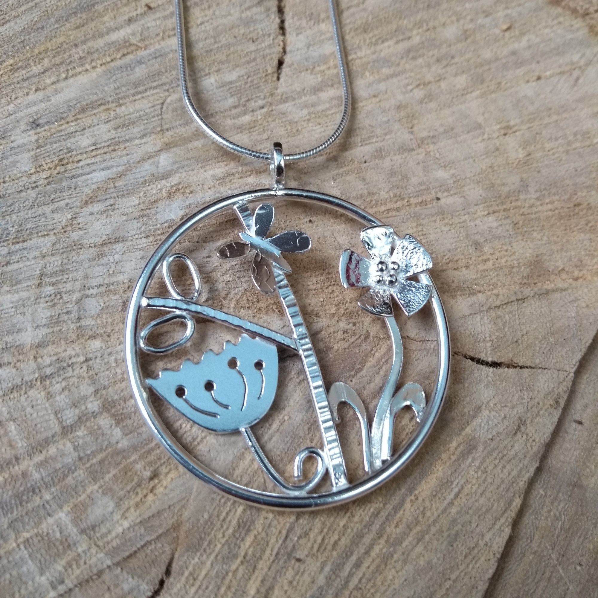 Silver butterfly and meadow pendant