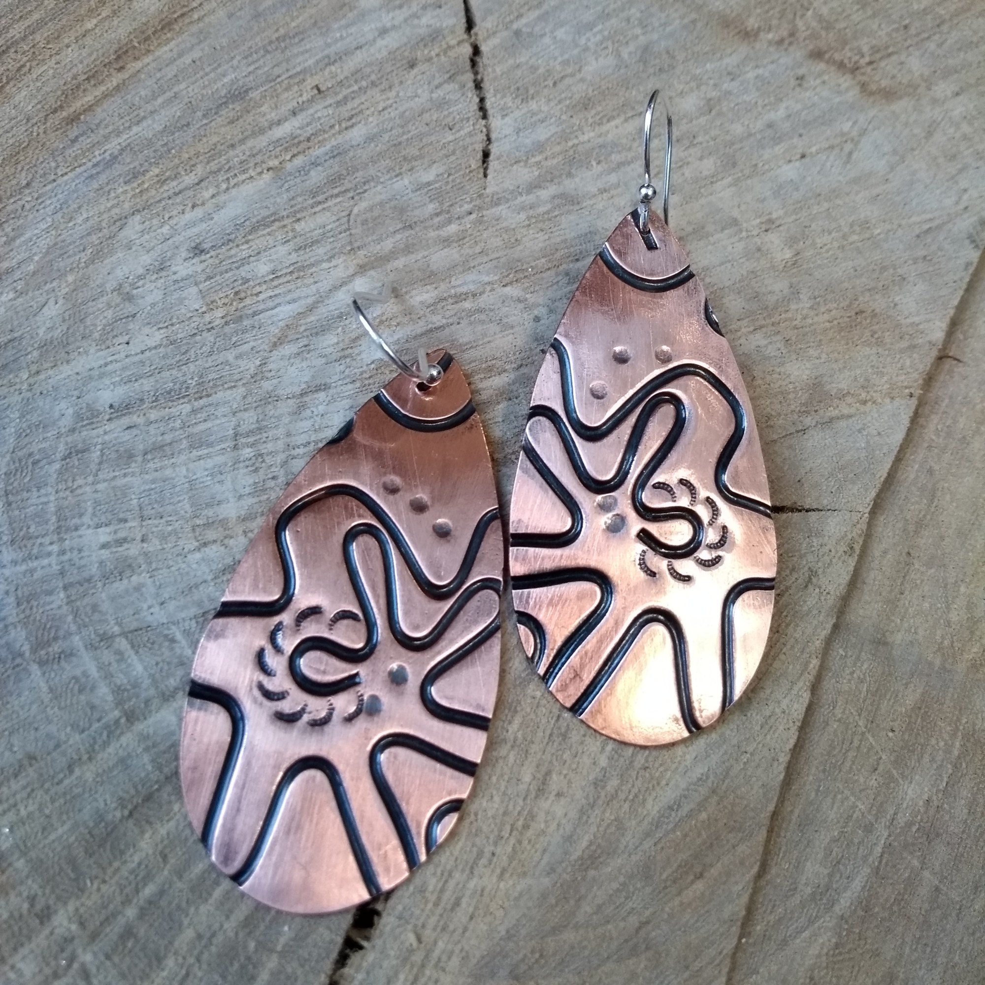 Copper oval textured dangle earrings