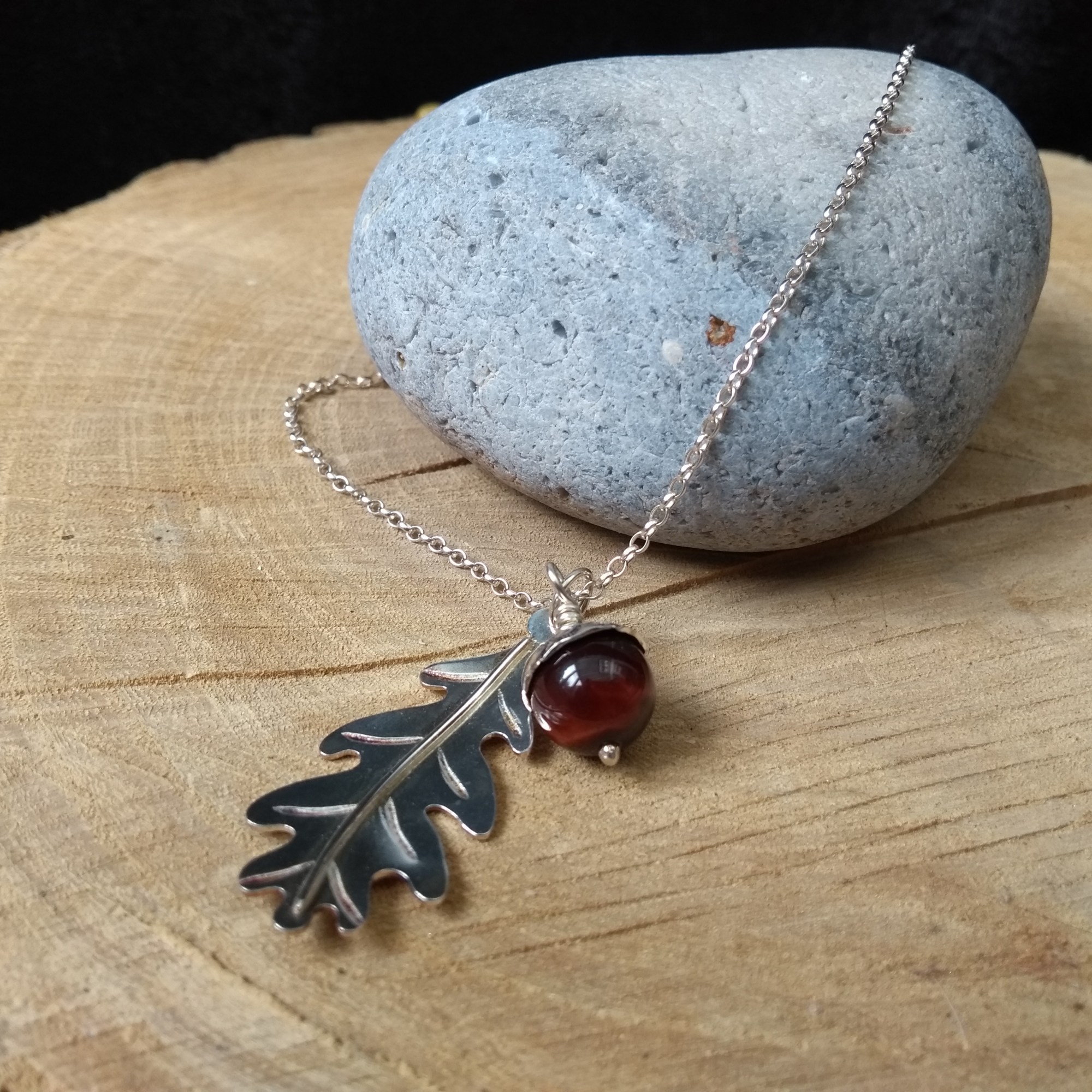 Silver acorn and oak leaf pendant with red tigers eye stone